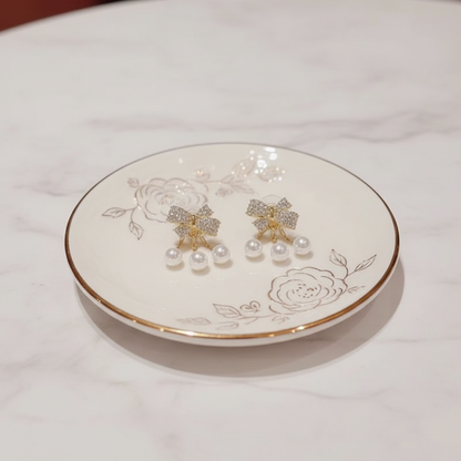 Bling The Bow Pearl Earrings