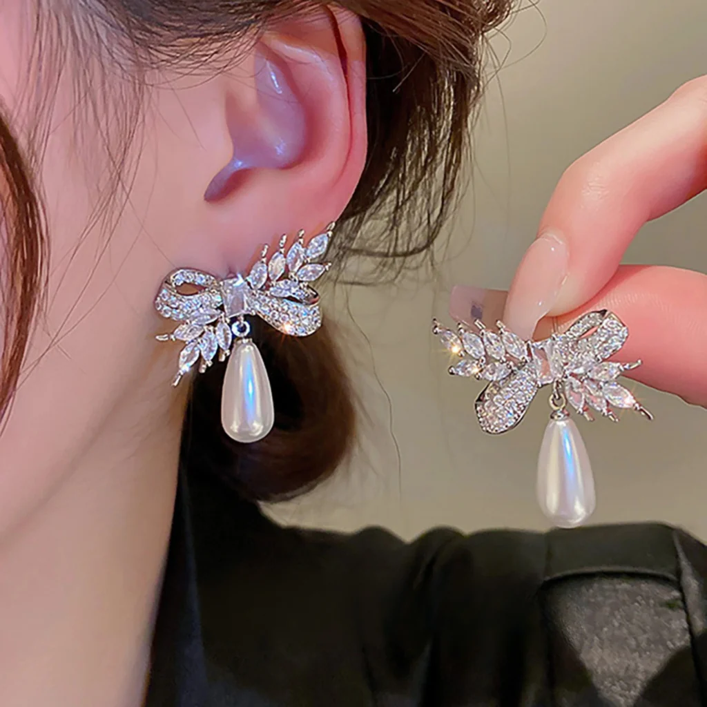 Statement Bow And Pearl Earrings