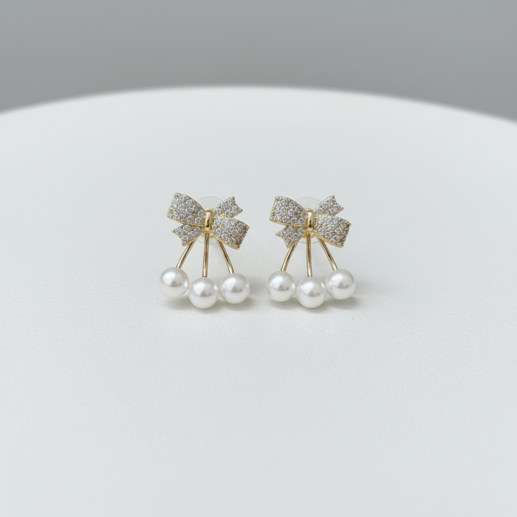 Bling The Bow Pearl Earrings