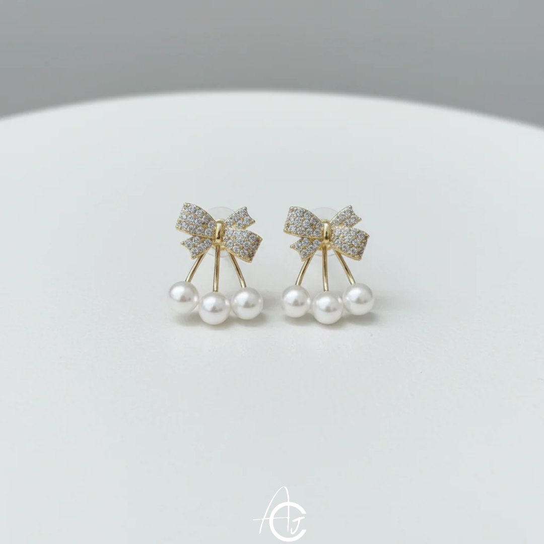 Bling The Bow Pearl Earrings